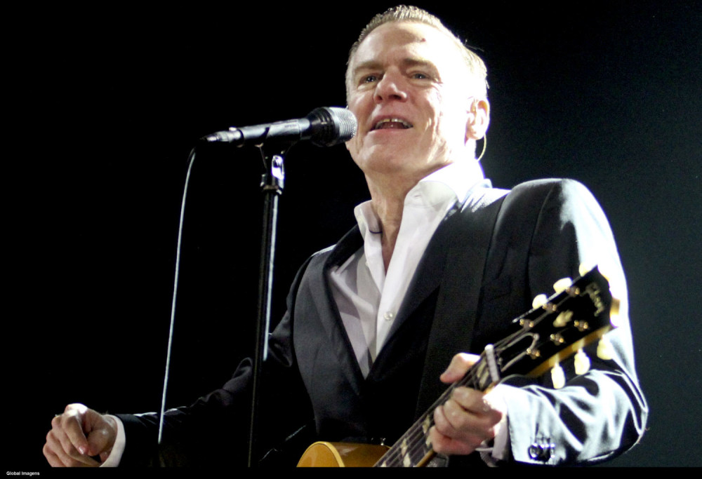 Carina žvrljala po gitari Brajana Adamsa