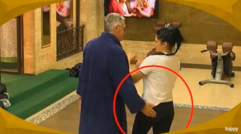 Matori Milojko hvata po zadnjici 40 godina mlađu takmičarku, napalio se