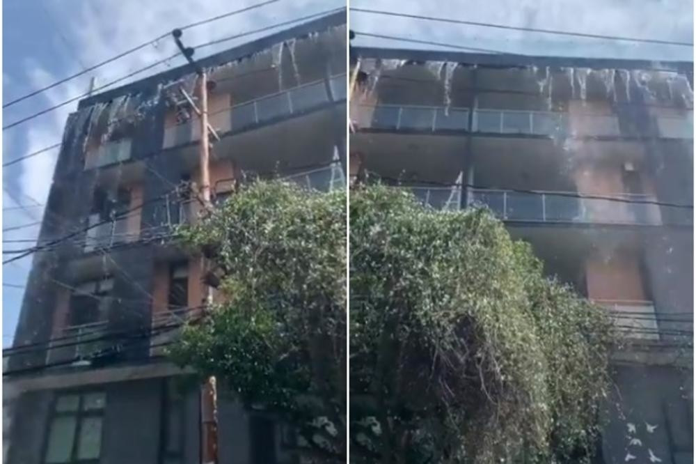 Voda se sručila na prolaznike! (VIDEO)