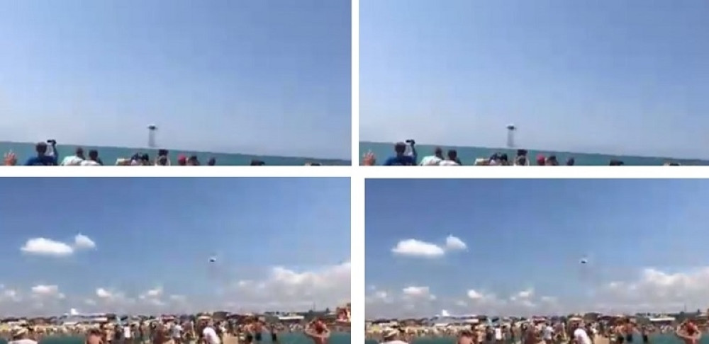 Su-24M u niskom letu iznad pune plaže (VIDEO)