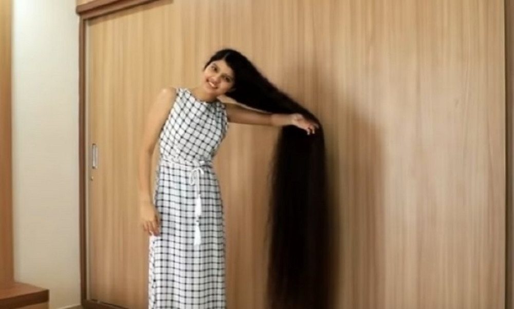 Ima najdužu kosu na svetu, a otkriva koliko dugo se nije ošišala i zbog čega (VIDEO)