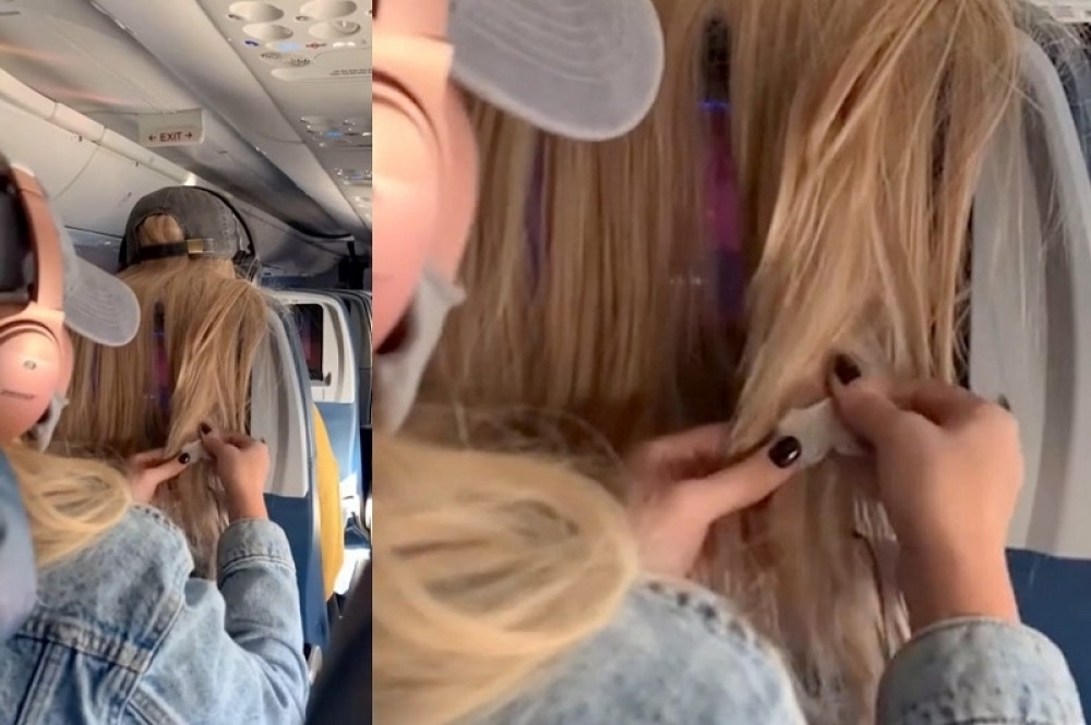 Bahatu plavušu skupo koštao bezobrazluk u avionu, pa je saputnica naučila pameti (VIDEO)