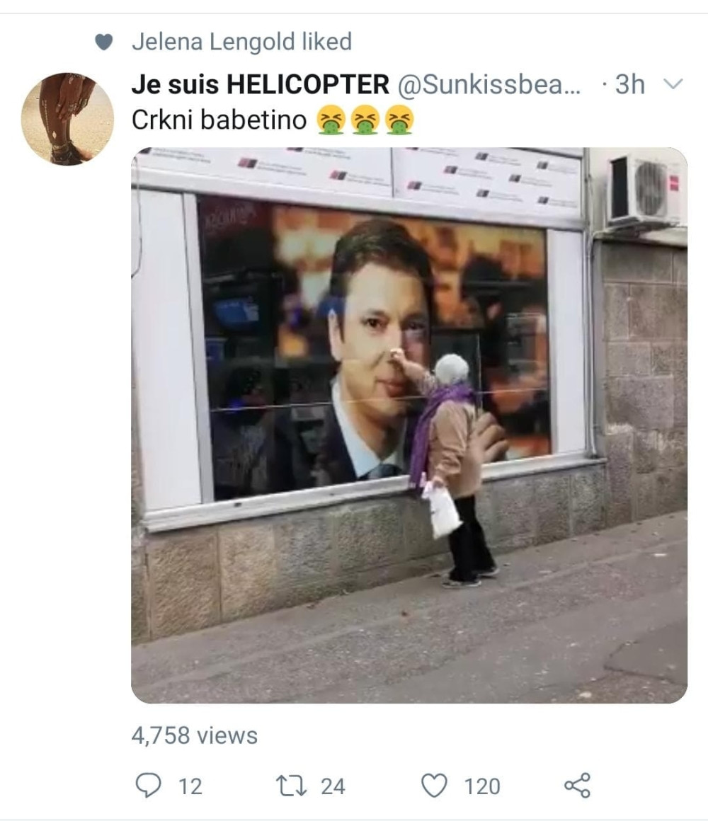 Baka koja je zastala da obriše izlog sa Vučićevom fotografijom postala meta đilasovaca (FOTO)